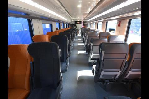 Economy class seating in Tver Carriage Works double-deck coach for Federal Passenger Co.